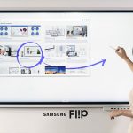 Woman using digital white board