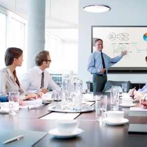 Conference room of people discussing Modern Technology