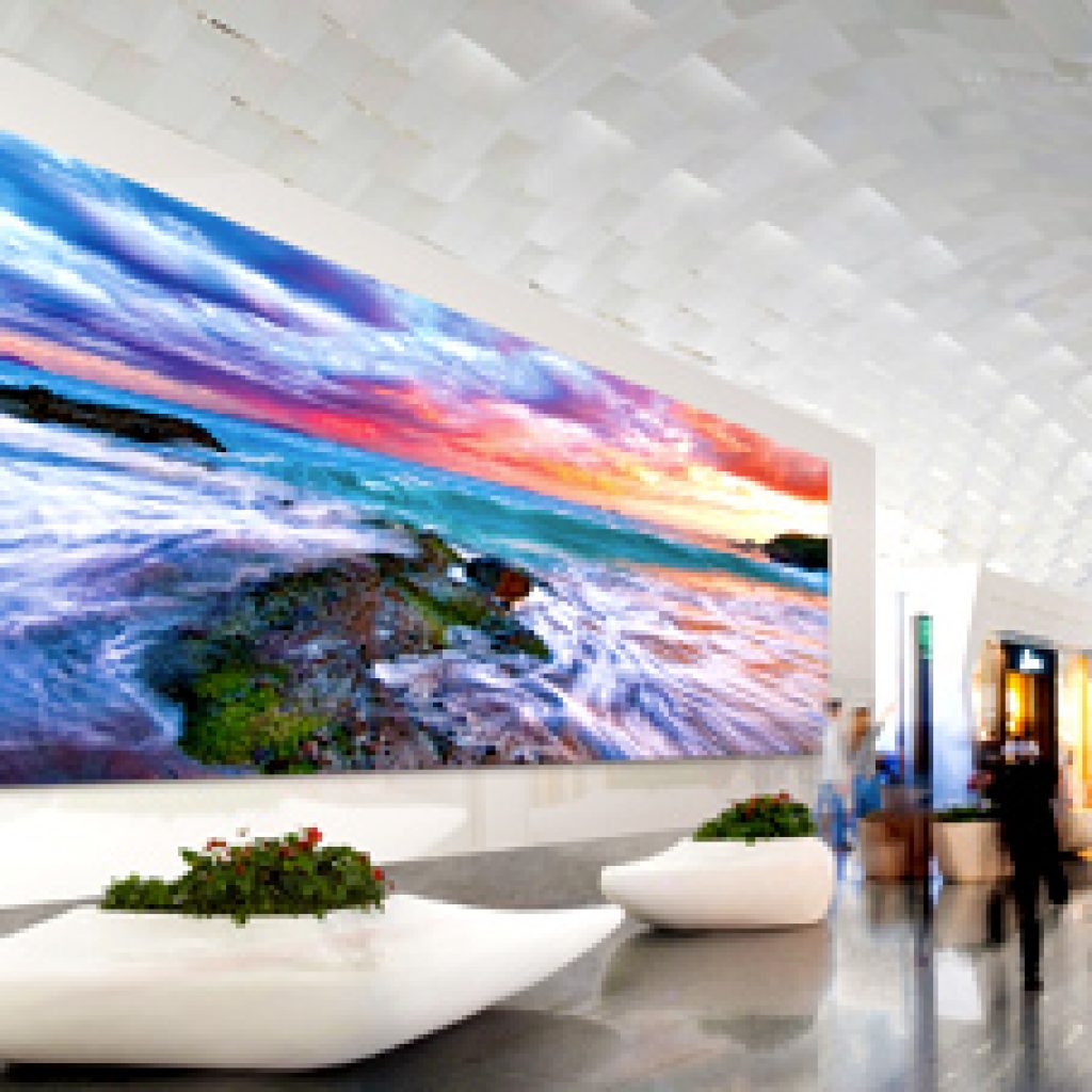 View of a wall displaying large digital signage