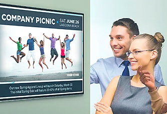 view of coworkers enjoying digital signage for offices