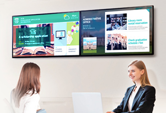 Two tvs displaying digital signage for offices