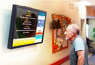 An older man viewing TV & Internet Senior Living