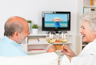 View of a couple enjoying TV & Internet Senior Living