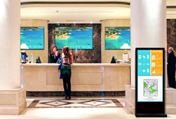 A Hotel TV behind the reception desk